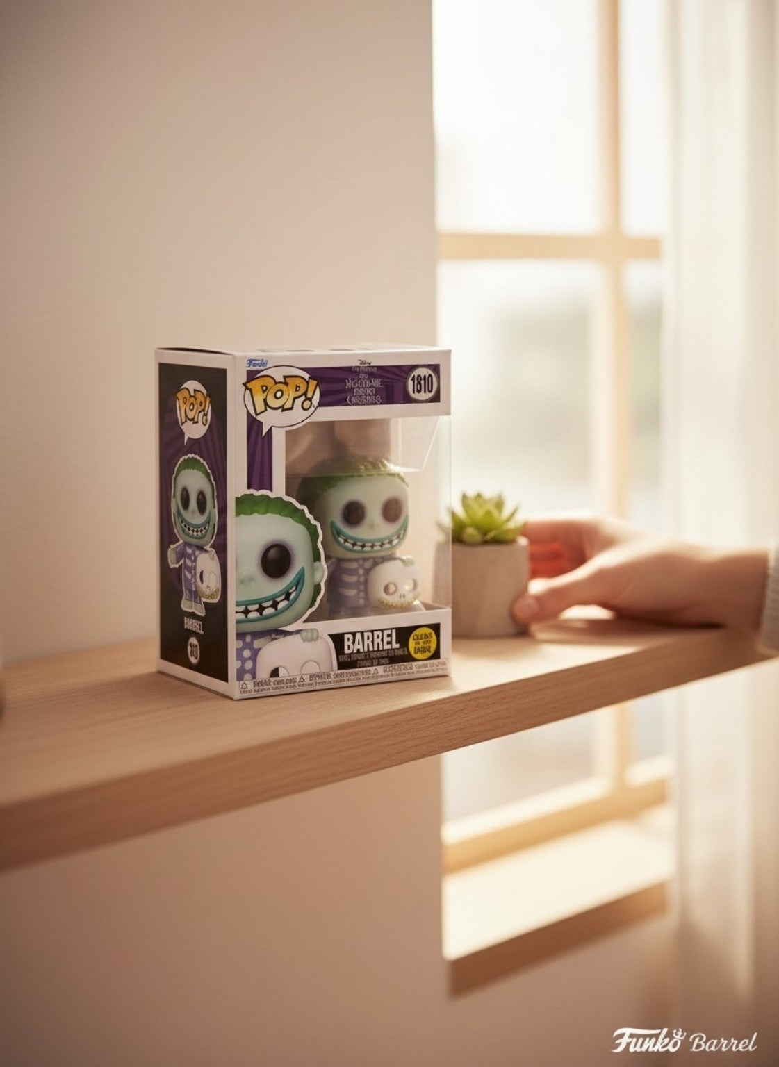 Funko Pop Barrel 1810 from The Nightmare Before Christmas displayed on a collector shelf